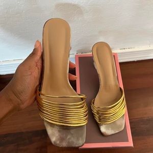 Brown heels with gold and clear bottom